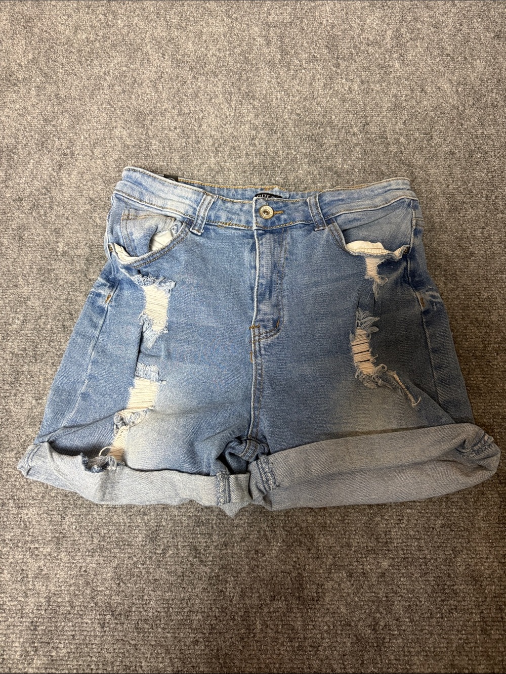 High-Rise Light Blue Distressed Denim Roll-Cuff Shorts - Womens